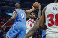 Detroit Pistons forward Trey Lyles (8) shoots against Los Angeles Clippers forward Serge Ibaka (9) during the first half of an NBA basketball game, Friday, Nov. 26, 2021, in Los Angeles. (AP Photo/Ringo H.W. Chiu)