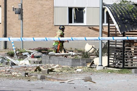 Rescue personnel is seen at the site of an explosion in Linkoping