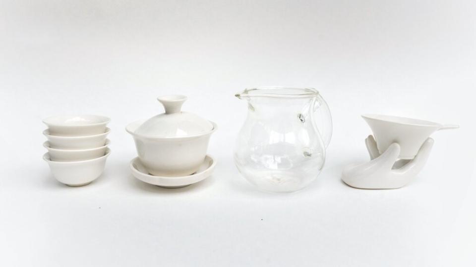 From left to right: traditional Chinese tea cups, a gaiwan, the fairness pitcher and a porcelain strainer. (Tea Drunk/Shunan Teng)