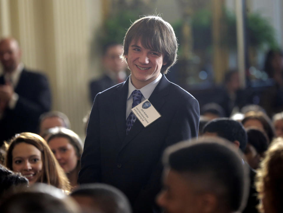 Jack Andraka, 15, from Glen Burnie, Md., stands up after being acknowledge by President Barack Obama during the White House Science Fair, Monday, April 22, 2013, in the East Room of the White House in Washington. Andraka is the 2012 Intel Science Fair grand prize winner for creating early detection pancreatic cancer test that is faster, cheaper and more sensitive than the test before it. (AP Photo/Pablo Martinez Monsivais)