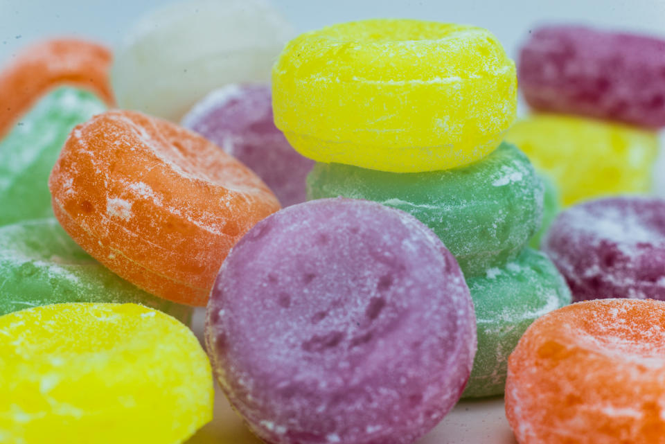 colorful sweet flavoured boiled sweets, candies, Candy on white, black background, hard candy