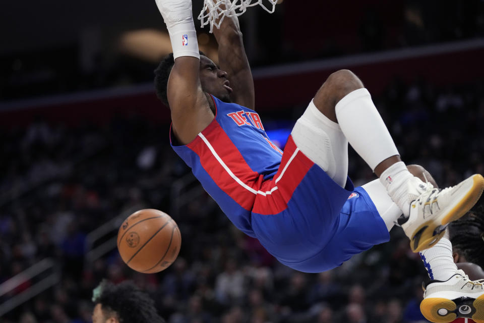 Detroit Pistons guard Hamidou Diallo dunks during the second half of an NBA basketball game against the Boston Celtics, Monday, Feb. 6, 2023, in Detroit. (AP Photo/Carlos Osorio)