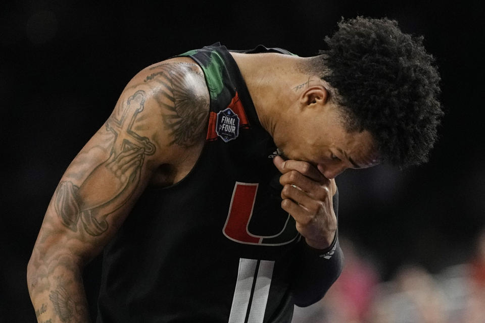 Miami guard Jordan Miller reacts to their loss against Connecticut during the second half of a Final Four college basketball game in the NCAA Tournament on Saturday, April 1, 2023, in Houston. (AP Photo/David J. Phillip)