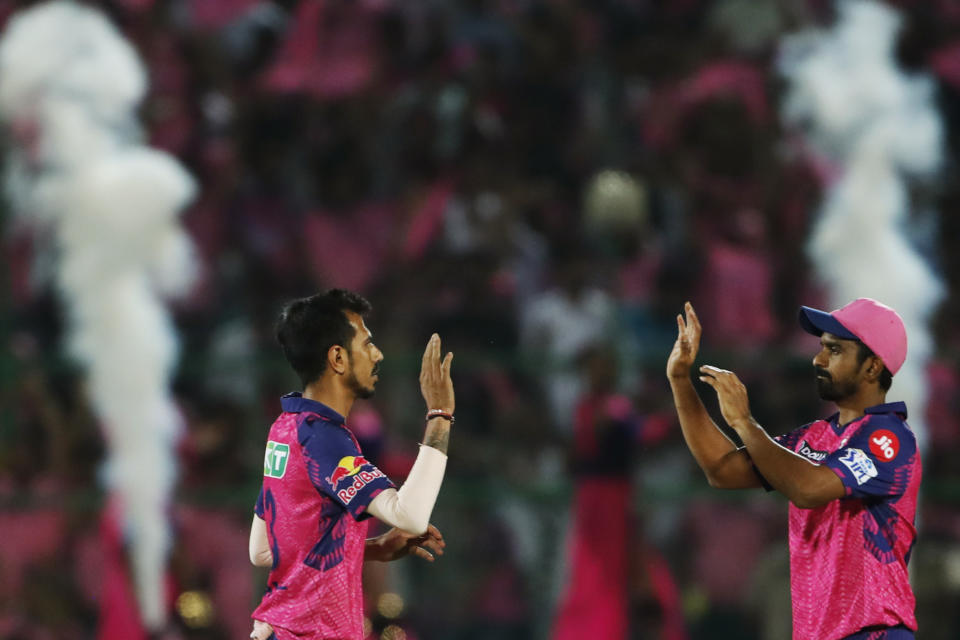 Rajasthan Royals' Yuzvendra Chahal, left, celebrates the wicket of Sunrisers Hyderabad's Heinrich Klaasen during the Indian Premier League cricket match between Rajasthan Royals and Sunrisers Hyderabad in Jaipur, India, Sunday, May 7, 2023. (AP Photo/Surjeet Yadav)