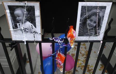 A makeshift memorial is left outside the Krim family apartment in New York, October 28, 2012. REUTERS/Carlo Allegri