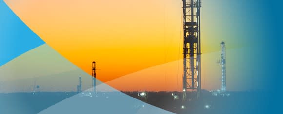 Multiple oil rigs against a sunset silhouette with blue-colored curves as accents.