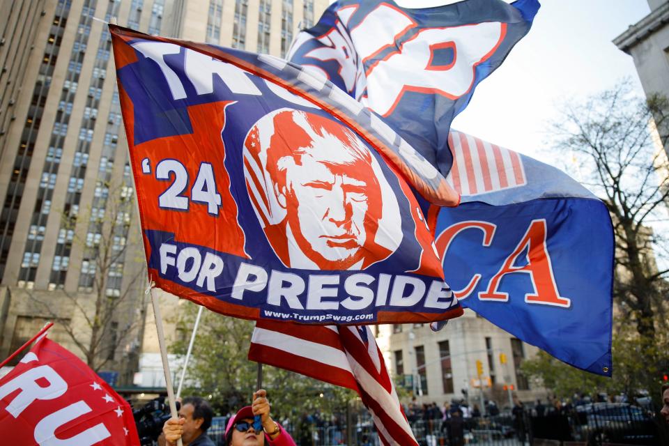 Supporters of former President Donald Trump demonstrate outside Manhattan criminal court, Monday, April 15, 2024, in New York. The hush money trial of Trump begins Monday with jury selection. It's a singular moment for American history as the first criminal trial of a former U.S. commander in chief. (AP Photo/Stefan Jeremiah)