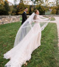 <p>For her big day, held outisde on a farm, <a href="https://people.com/style/jennifer-gates-wears-custom-vera-wang-wedding-dress-nayel-nassar/" rel="nofollow noopener" target="_blank" data-ylk="slk:Jennifer wore;elm:context_link;itc:0;sec:content-canvas" class="link ">Jennifer wore</a> a custom ivory colored long-sleeve A-line Vera Wang Haute gown. The romantic design included hand appliqué French macrame lace on the bodice, sleeves and Italian tulle skirt. She topped off the look with matching tulle chapel-length veil trimmed in hand appliqué French macrame lace.</p>