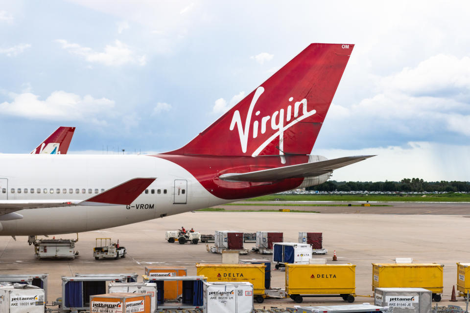 ORLANDO, FLORIDA, UNITED STATES - 2019/07/19: The 'Virgin' branding in the tail of a large commercial plane. The marking belongs to the Virgin Atlantic British airline. The plane is seen in the Orlando airport. (Photo by Roberto Machado Noa/LightRocket via Getty Images)