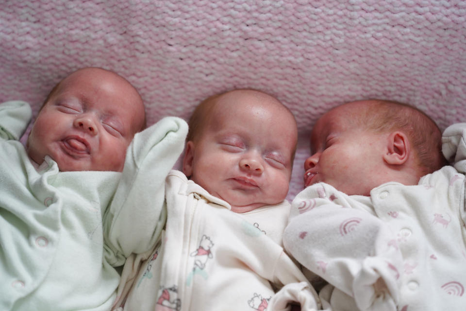 The girls' are so alike their parents struggle to tell the difference between them, pictured L-R, Evalynn Casper, Harper-Gwen Casper and Marvella Casper. (James Casper/SWNS)