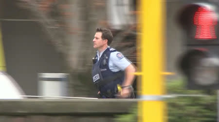 A police officer is seen after reports that several shots had been fired at a mosque, in central Christchurch, New Zealand March 15, 2019, in this still image taken from video. TVNZ/via REUTERS TV