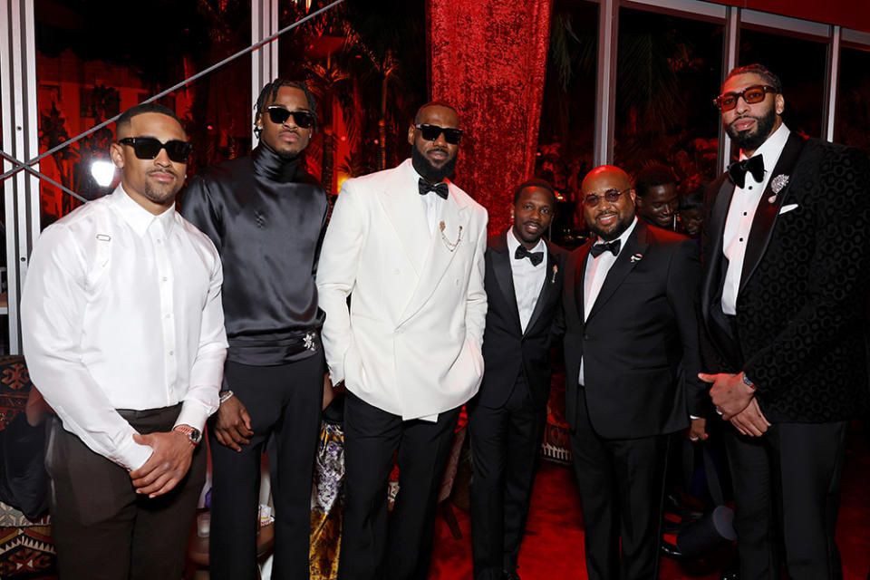 LeBron James (3rd from L) and Anthony Davis (R) attend the 2024 Vanity Fair Oscar Party Hosted By Radhika Jones at Wallis Annenberg Center for the Performing Arts on March 10, 2024 in Beverly Hills, California.