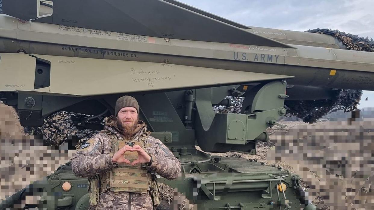 ukrainian soldier poses next to spanish donated mim 23 hawk air defense system