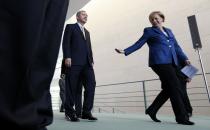 <p>Turkey’s Prime Minister Tayyip Erdogan (L) and German Chancellor Angela Merkel arrive to address a news conference following their bilateral talks in Berlin October 9, 2010. (Fabrizio Bensch/Reuters) </p>