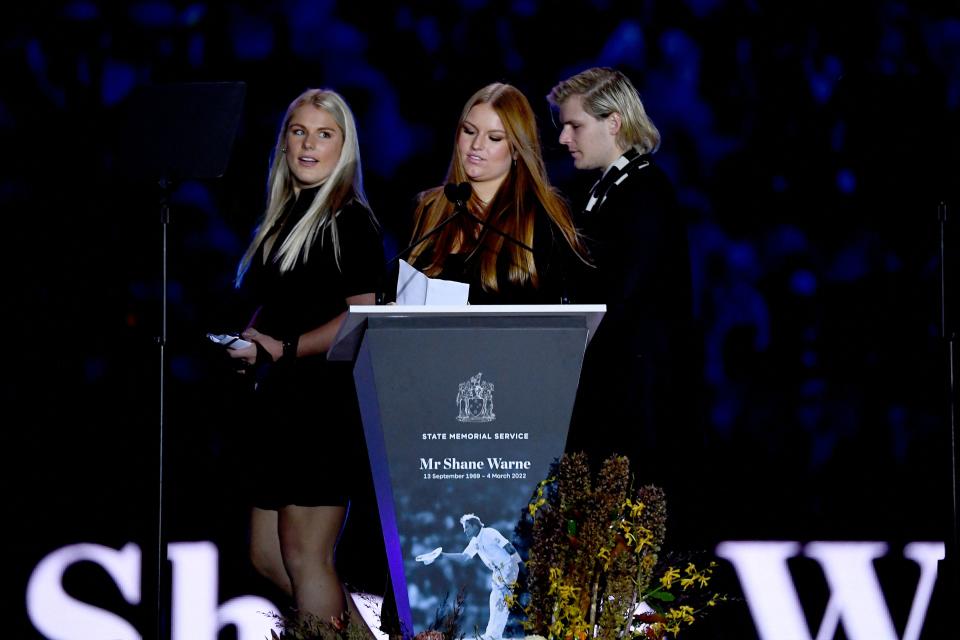 Shane Warne's children Summer, Brooke and Jackson, pictured here at his state memorial at the MCG.