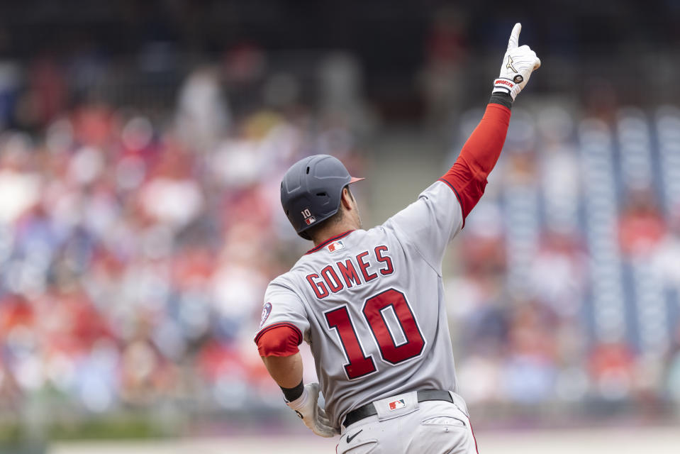 Washington Nationals' Yan Gomes gestures as he runs the bases after hitting a two-run home run during the seventh inning of a baseball game against the Philadelphia Phillies, Thursday, July 29, 2021, in Philadelphia in the first game of a double header. (AP Photo/Laurence Kesterson)