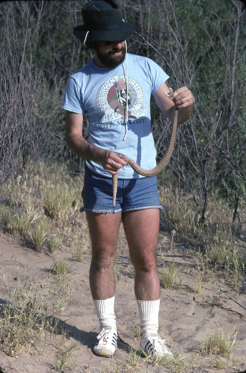 In this June 1982 self portrait, C. Kenneth Dodd Jr. holds a pink Grand Canyon Rattlesnake. Dodd was participating in a survey of riparian areas along the Colorado River with the National Park Service and the U.S. Fish & Wildlife Service. (Courtesy of C. Kenneth Dodd Jr. via AP)