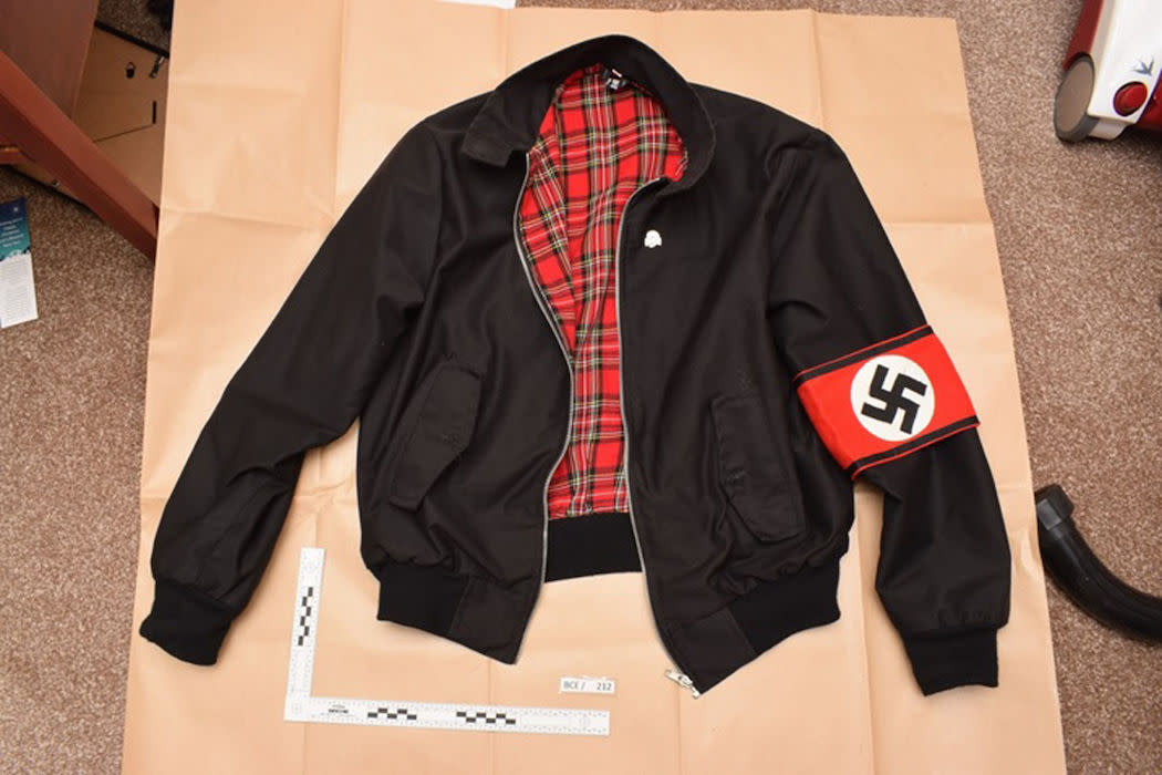 A photo of a jacket bearing a Swastika armband found during police searches of the home of Adam Thomas and Claudia Patatas (Picture: PA)