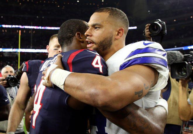 Dallas Cowboys quarterback Dak Prescott, right, and Houston Texans quarterback Deshaun Watson are among the highest paid players in the NFL.