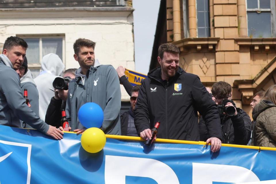 Adam Collin, front right, on Mansfield's open topped bus on Sunday <i>(Image: Richard Parkes)</i>