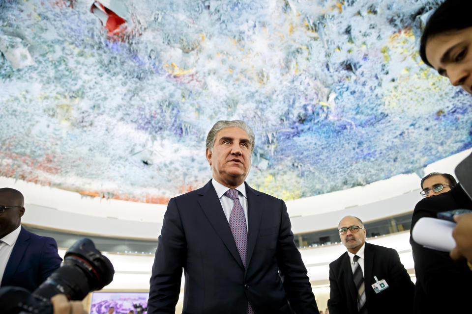 Pakistan's Foreign Minister Shah Mehmood Qureshi leaves after a statement during the 42nd session of the Human Rights Council at the European headquarters of the United Nations in Geneva, Switzerland, Tuesday, Sept. 10, 2019. (Salvatore Di Nolfi/Keystone via AP)