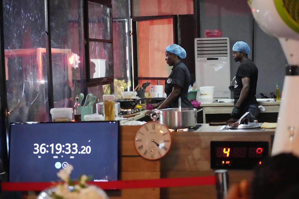 Chef, Hilda Baci, cooked to establish a new Guinness world record , for the "longest cooking marathon". The 97-hour cook-a-thon in Lagos, Nigeria. Saturday, May. 13, 2023. A Nigerian chef on Monday continued her quest to set a new global record for the longest hours of nonstop cooking after surpassing the current record of 87 hours and 45 minutes. By 15:00 GMT on Monday, Hilda Baci had cooked for more than 97 hours, becoming a national sensation and to the cheering of many in Nigeria's commercial hub of Lagos where her kitchen is set. (AP Photo/Sunday Alamba)