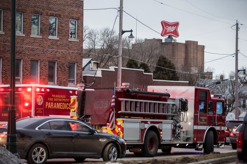 Police investigate a shooting at the Molson Coors headquarters in Milwaukee, Wisconsin