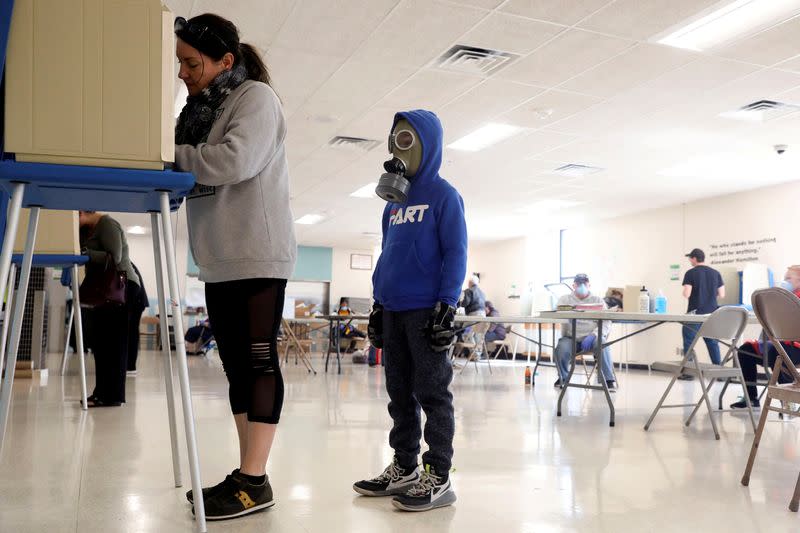 FILE PHOTO: Voters cast ballots during the presidential primary election in Wisconsin