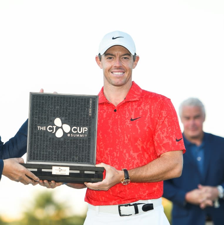 Rory McIlroy celebrates winning his 20th PGA Tour title at the CJ Cup (AFP/Alex Goodlett)