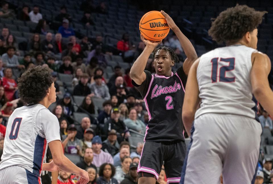 Lincoln's Donez Lindsey, right, shoots over Modesto Christian's Myles Jones in the Sac-Joaquin Section boys basketball championship game at Golden One Center in Sacramento on Feb. 21. 2024. Modesto Christian won 68-63. CLIFFORD OTO/THE STOCKTON RECORD
