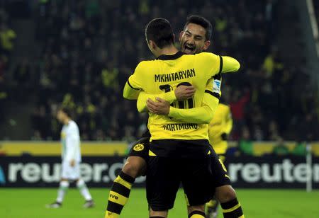 Football Soccer - Borussia Moenchengladbach v Borussia Dortmund - German Bundesliga - Borussia Park, Moenchengladbach, 23/01/16 Borussia Dortmund's Ilkay Guendogan and Henrikh Mkhitaryan (L) celebrate a goalREUTERS/Ina Fassbender