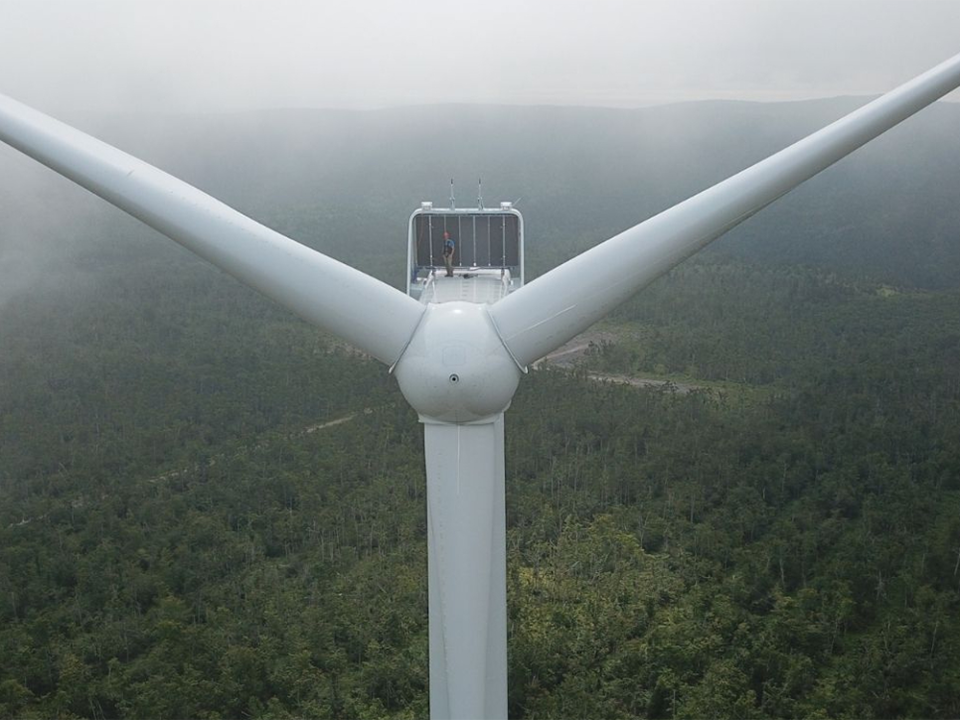  A maintenance worker stands atop one of the huge wind turbines belonging to TransAlta Corp., at the Kent Hills wind farm in Caledonia Mountain, south of Moncton.