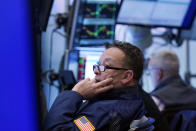 Traders work on the floor of the New York Stock Exchange, Wednesday, Dec. 1, 2021. Wall Street has investors on another roller-coaster ride Wednesday, as an early stock market rally lost steam in afternoon trading. (AP Photo/Richard Drew)