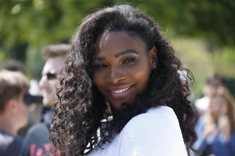 Top seed Serena Williams, seen here in Paris on May 22, 2015, could meet sister Venus in the last 16 of the French Open