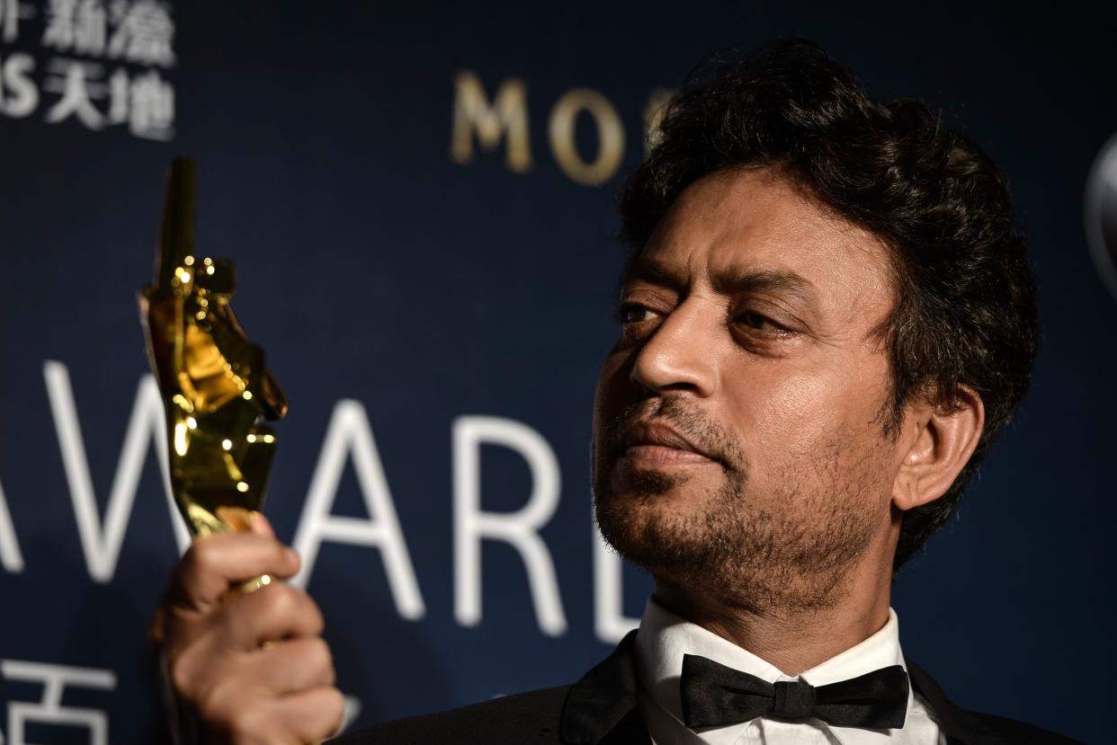 <p>File image: Irrfan Khan poses with his trophy during the Asian Film Awards in 2014</p> (Getty Images)