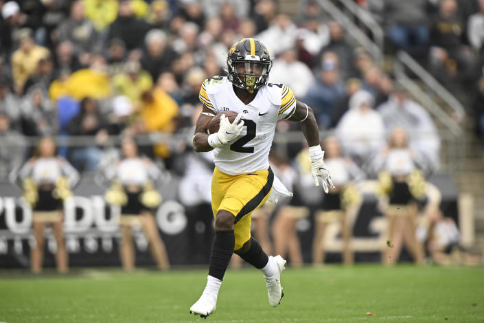Iowa running back Kaleb Johnson (2) carries the ball down field during the second half of an NCAA college football game against Purdue, Saturday, Nov. 5, 2022, in West Lafayette, Ind. (AP Photo/Marc Lebryk)