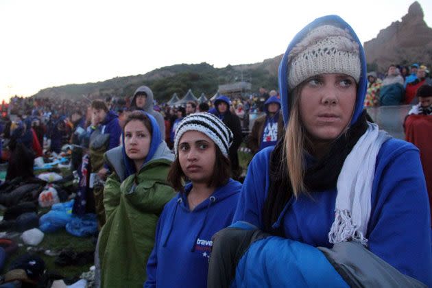 Australians and New Zealanders attend a ceremony marking the 98th anniversary of Anzac Day at Anzac Cove. Photo: AAP