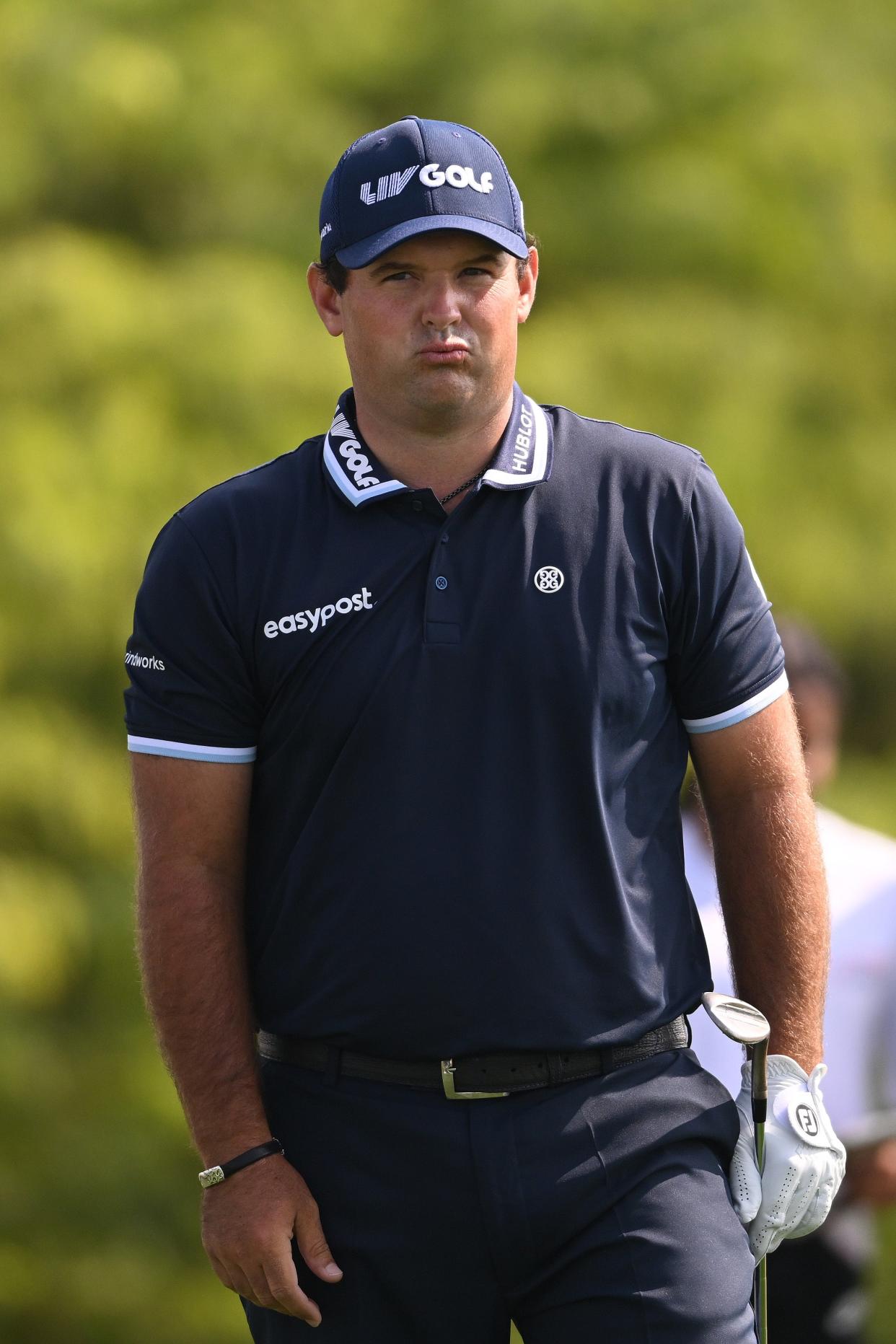 Patrick Reed of The United States reacts after chipping on the 8th hole (Getty Images)