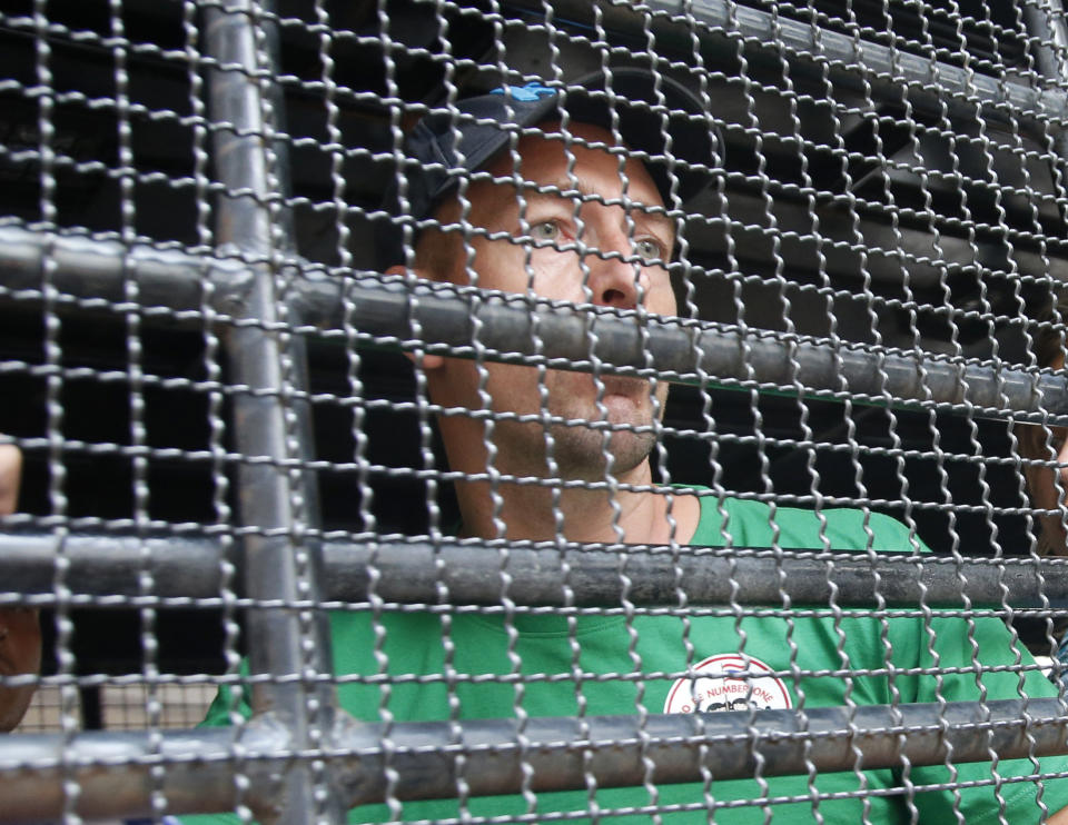 Russian self-styled sex guru Alexander Kirillov, second from right, looks out of a van leaving the Immigration Detention Center for an airport for deportation, in Bangkok, Thailand, Thursday, Jan. 17, 2019. Kirillov was arrested for holding a sex training seminar in Pattaya, Thailand, in February 2018. (AP Photo/Sakchai Lalit)