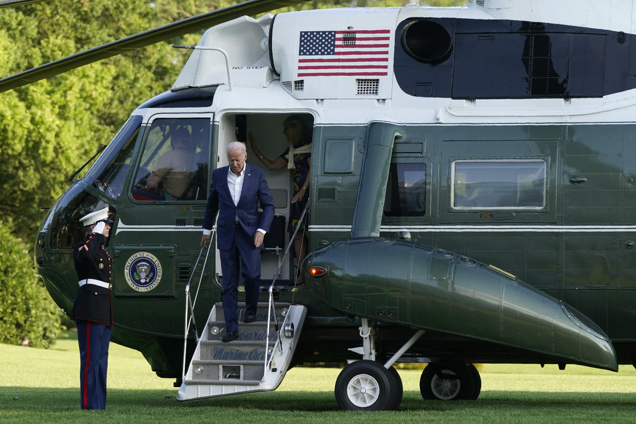 President Joe Biden and first lady Jill Biden step off Marine One on the South Lawn of the White House, Sunday, June 27, 2021, in Washington. The Bidens are returning from a weekend at Camp David. (AP Photo/Patrick Semansky)