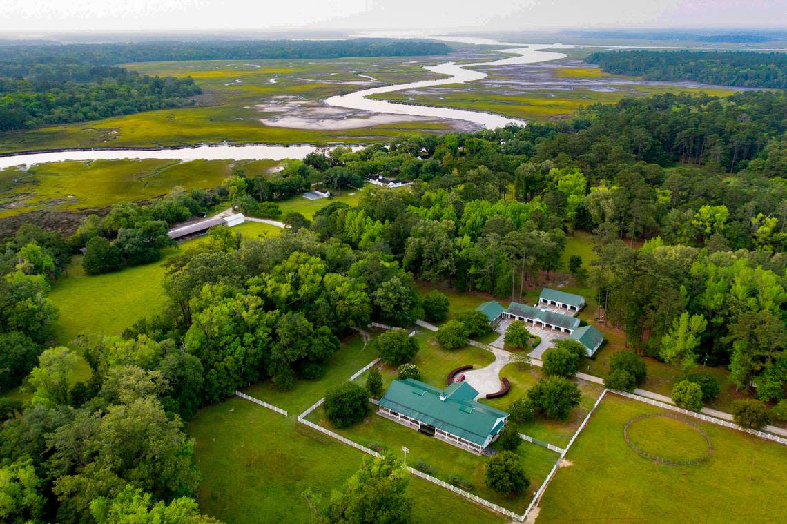 An aerial view of the eight-stable horse barn, which is attached to fifteen acres of three-board fenced pasture at Gregorie Neck estate in Yemassee, SC. The property is now officially on the market with an asking price of $39,500,000.