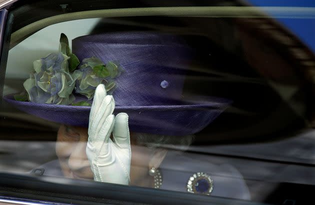 Britain's Queen Elizabeth waves to Pope Francis at the end of their meeting at the Vatican on April 3, 2014. (Photo: Gregorio Borgia/AP)