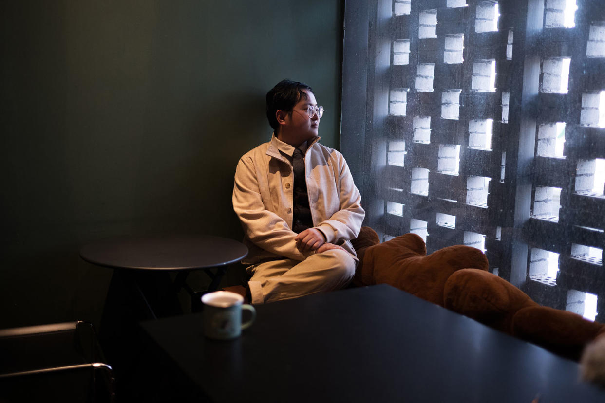 Wang Zichen, a former café owner, at SIP coffee in Beijing. (Fred Dufour / NBC News)