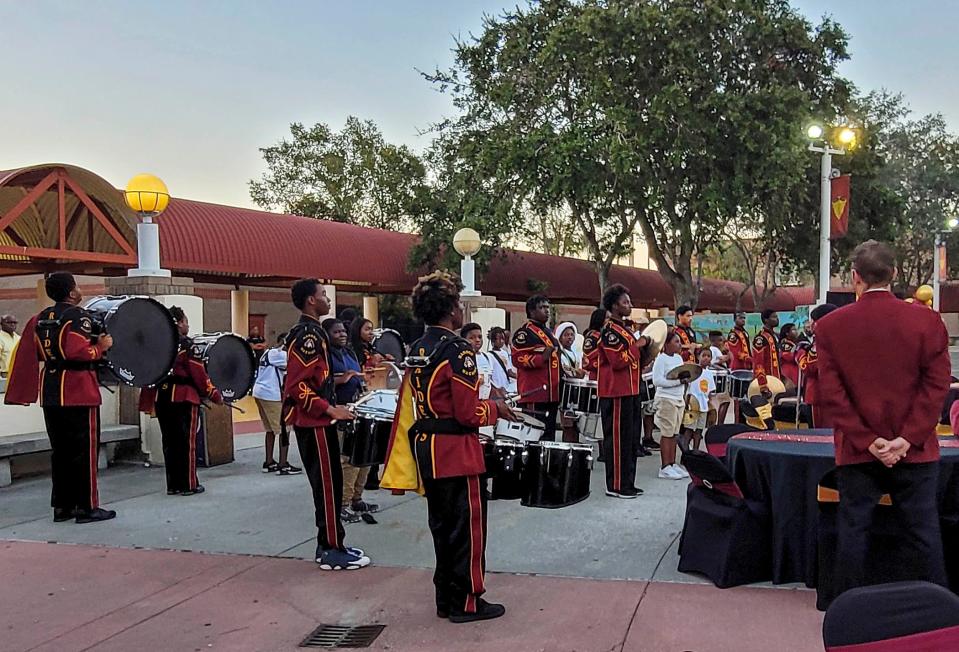 The Glades Central High School marching band performs Dec. 9 at a ceremony honoring Willie and Estella Pyfrom and naming the school's music hall in their honor. Many of Pyfrom's band students rose from Glades Central to the Marching 100 at Florida A&M University.