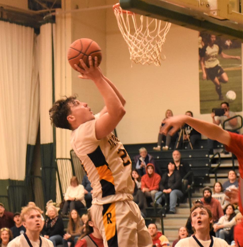 Richfield Springs/Owen D. Young Indian Dylan Hosford lays the ball up for a basket against Oppenheim-Ephratah-St. Johnsville Jan. 14 at Herkimer College. Hosford, a junior, broke the Richfield Springs career scoring record Tuesday in Laurens; he now has 1,289 varsity points.