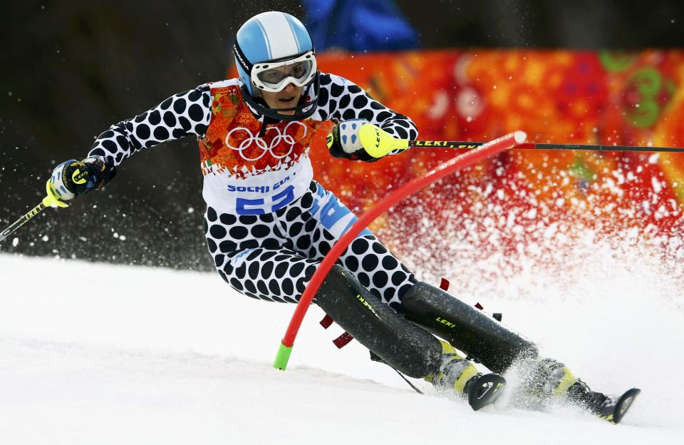 Argentina's Simari Birkner clears a gate during the first run of the women's alpine skiing slalom event at the 2014 Sochi Winter Olympics