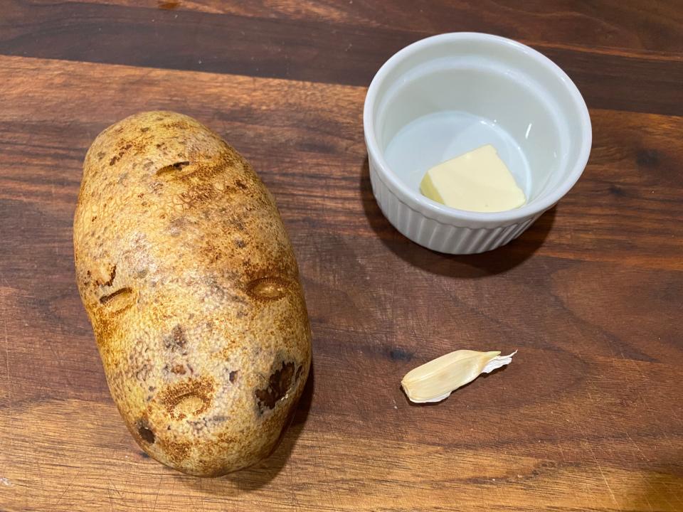 ingredients for 10-hour slow cooker baked potato on a kitchen counter