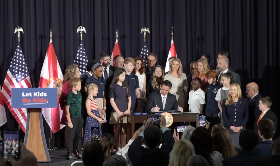 Gov. Ron DeSantis signs a bill Wednesday restricting gender-affirming care for transgender youths. Advocates say a lack of access to hormone treatments, puberty blockers and surgeries could lead to more teen suicides.