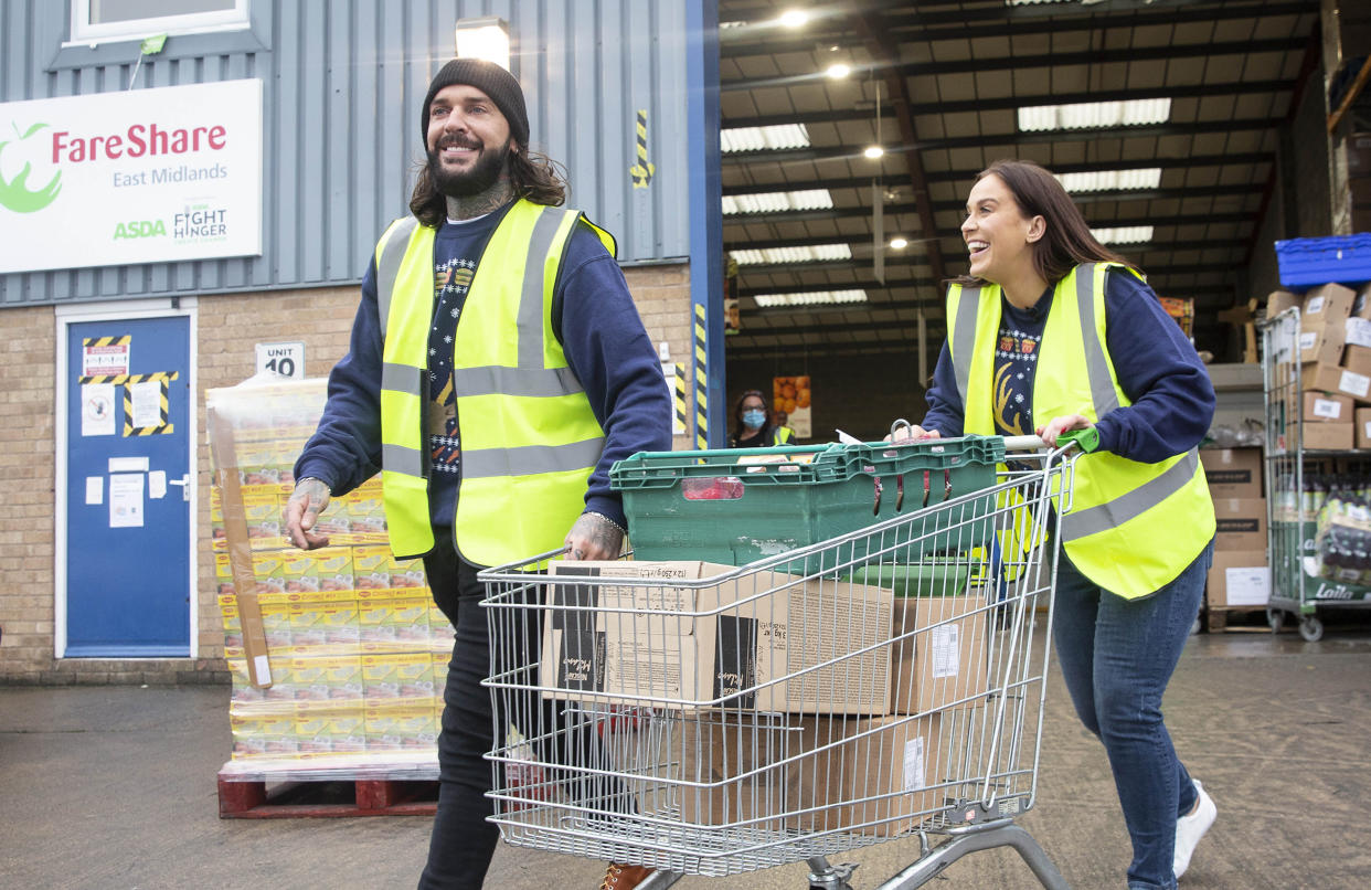 EMBARGOED TO 0001 MONDAY DECEMBER 21 EDITORIAL USE ONLY Vicky Pattison and Pete Wicks visit a FareShare facility in the East Midlands to see how food, donated in partnership with McDonald's, is sorted and distributed to families in need this Christmas.