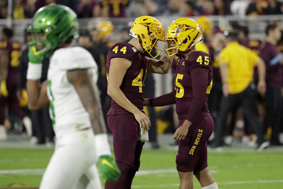 Arizona State's Christian Zendejas (45) celebrates his field goal with punter Kevin Macias (44) during the first half of an NCAA college football game against Oregon, Saturday, Nov. 23, 2019, in Tempe, Ariz. (AP Photo/Matt York)